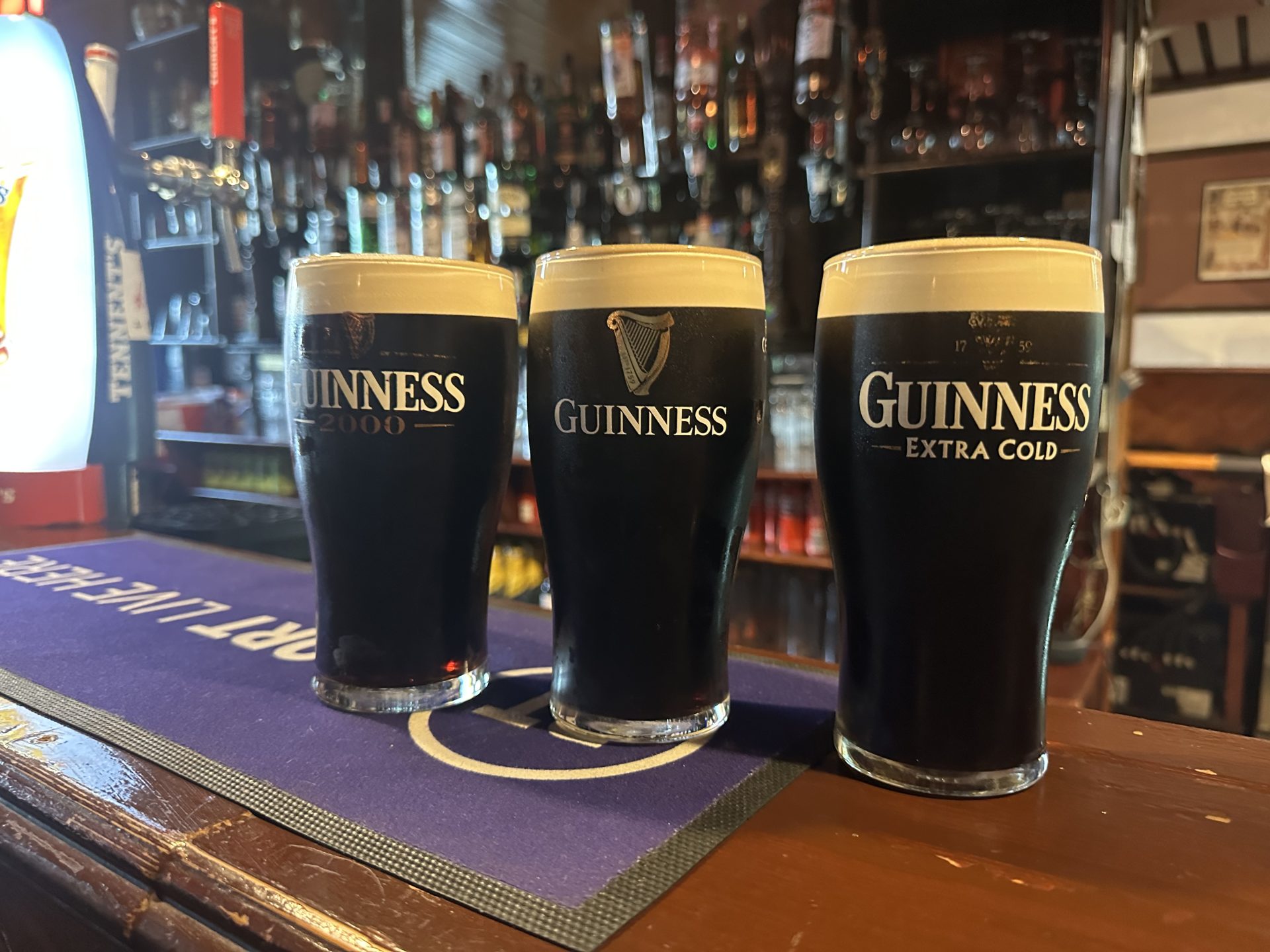 three Guinness just poured at Mourne View Bar